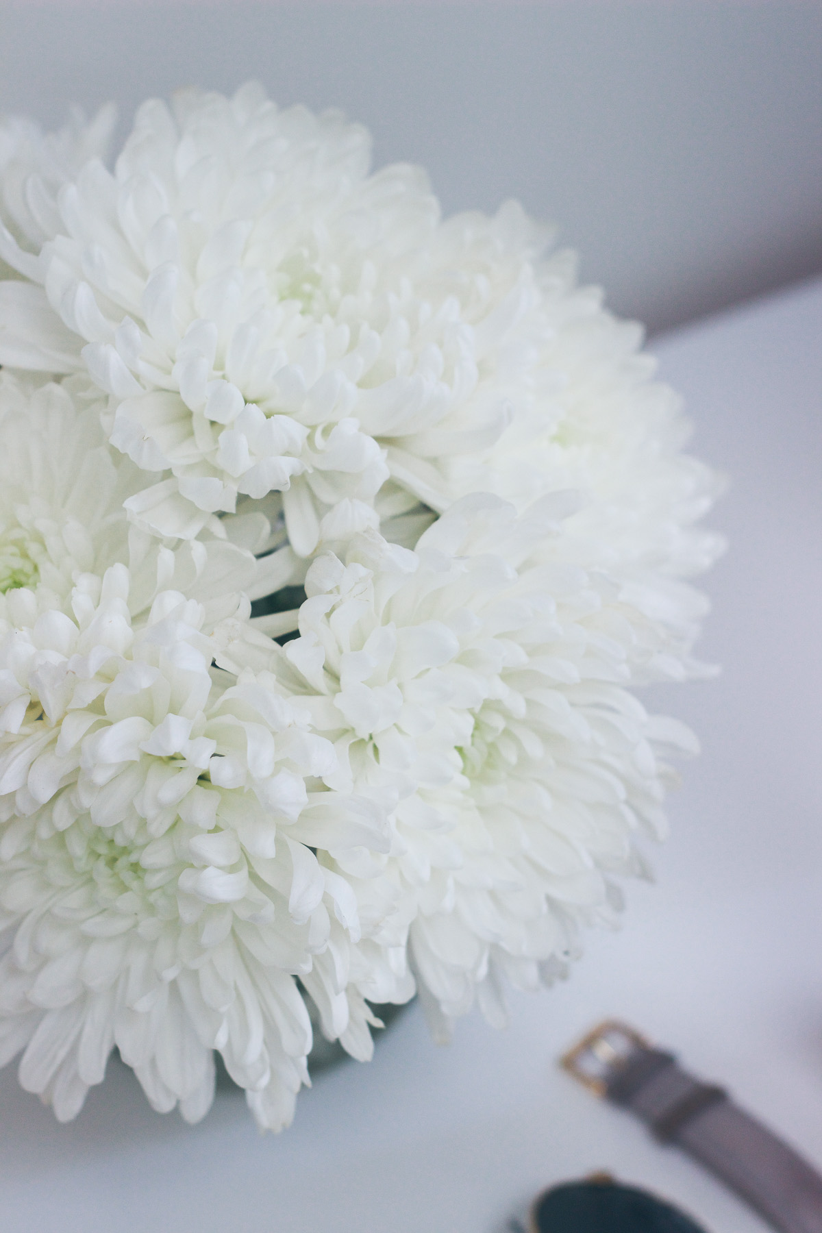 white desk flowers